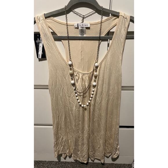 Libian Tops - cream-colored tank top racerback
 and scoop neckline the brand Libian size 3xl